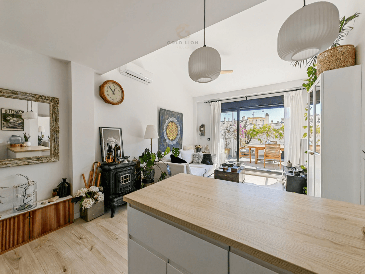Penthouse for sale with a south orientation and unobstructed views of the park and the mountains.