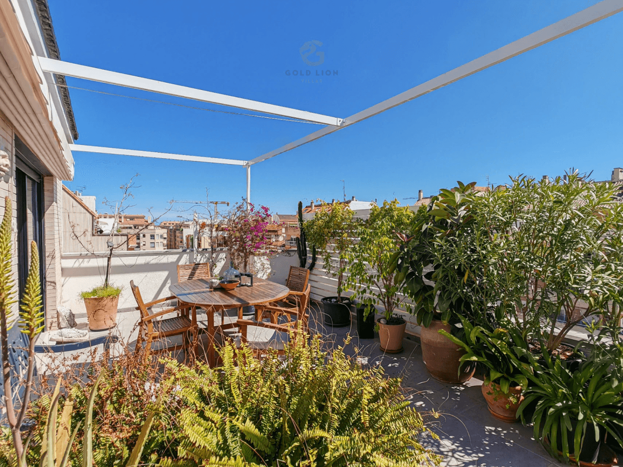 Penthouse for sale with a south orientation and unobstructed views of the park and the mountains.
